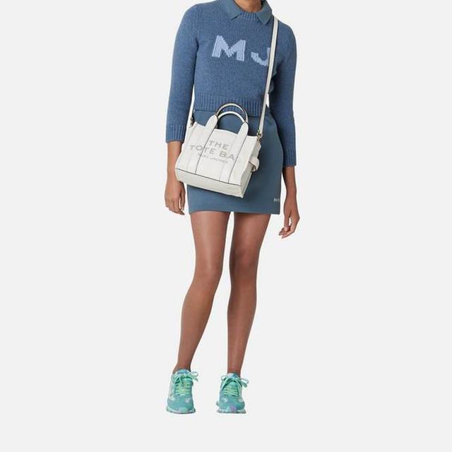 MARC JACOBS MJ The Mini Traveler logo