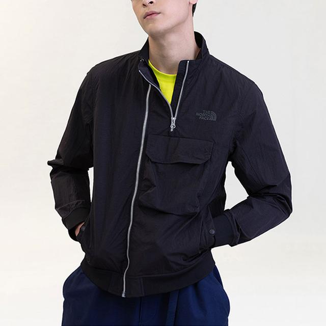 THE NORTH FACE Urban Exploration City Wind Jkt Logo