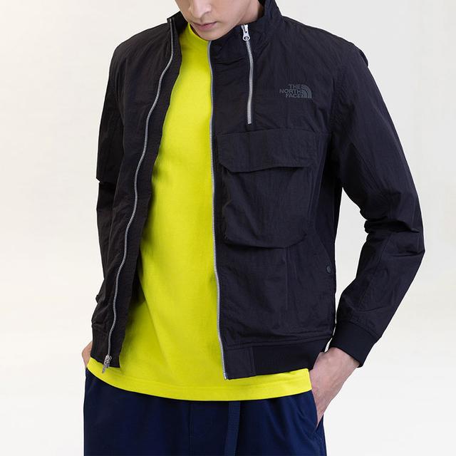 THE NORTH FACE Urban Exploration City Wind Jkt Logo