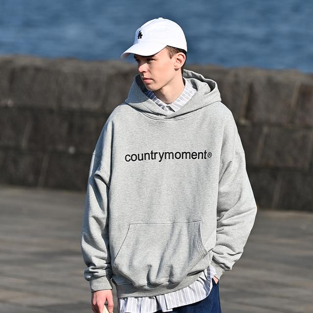 COUNTRY MOMENT Logo