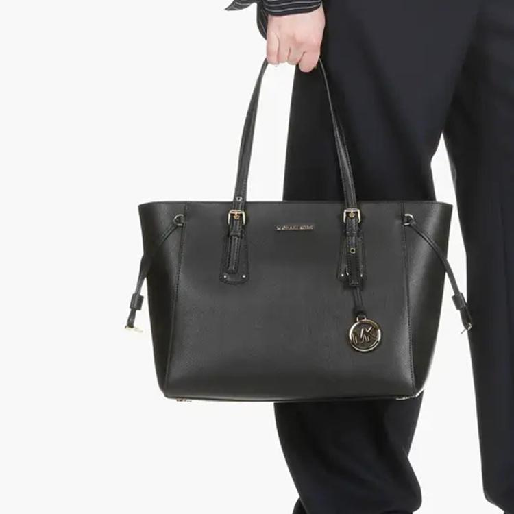 MICHAEL KORS MK Voyager Logo