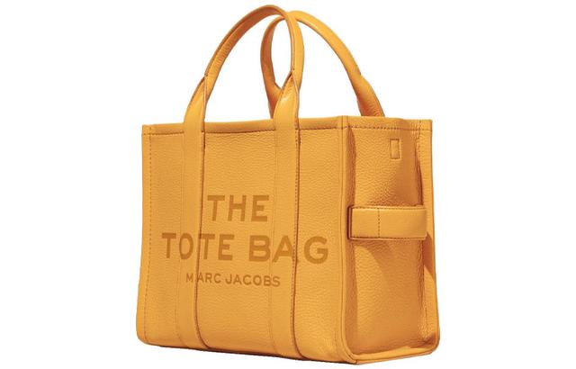 MARC JACOBS MJ The Traveler logo