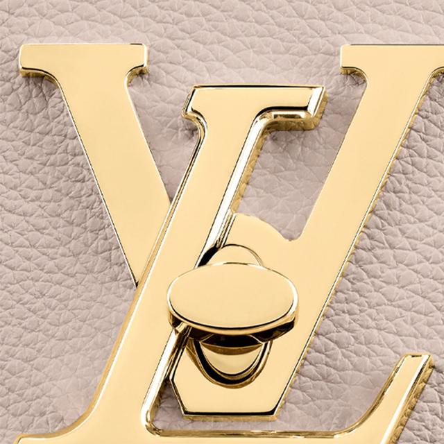 LOUIS VUITTON Lockme Logo