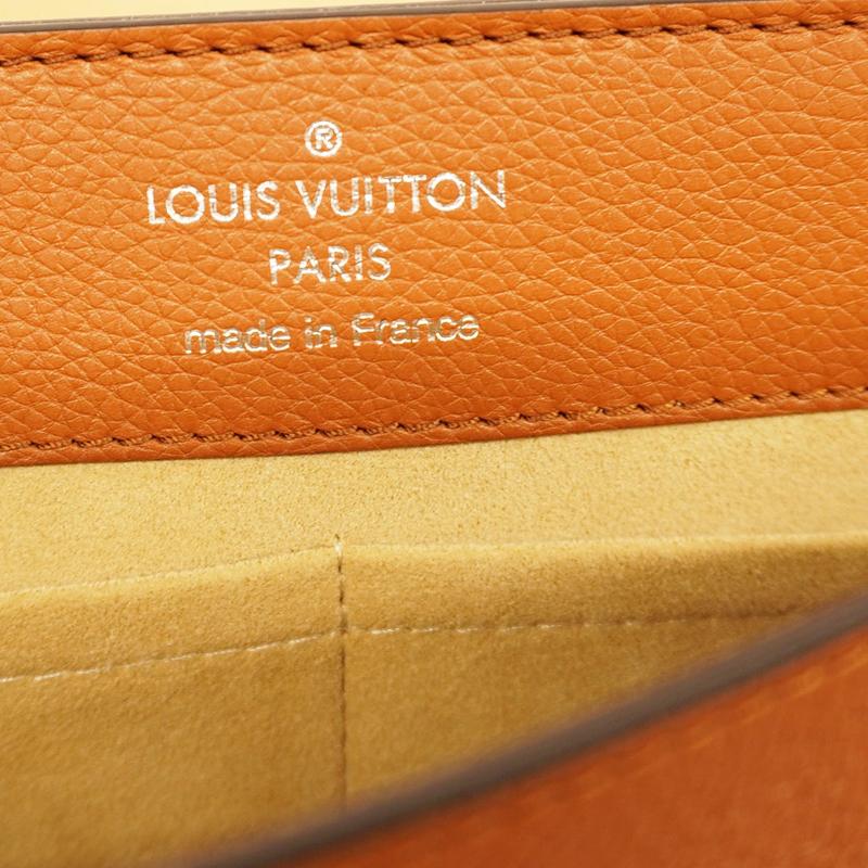 LOUIS VUITTON Lockme Ever Logo